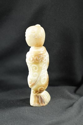 Lot 501 - A CHINESE CARVED JADE RELIGIOUS FIGURE