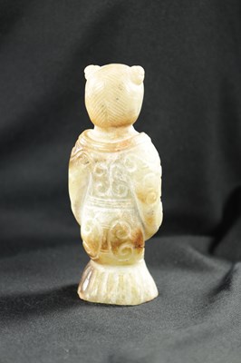 Lot 501 - A CHINESE CARVED JADE RELIGIOUS FIGURE