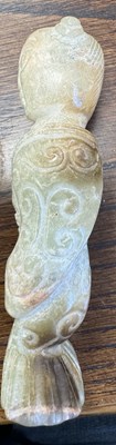 Lot 501 - A CHINESE CARVED JADE RELIGIOUS FIGURE
