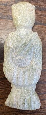 Lot 501 - A CHINESE CARVED JADE RELIGIOUS FIGURE