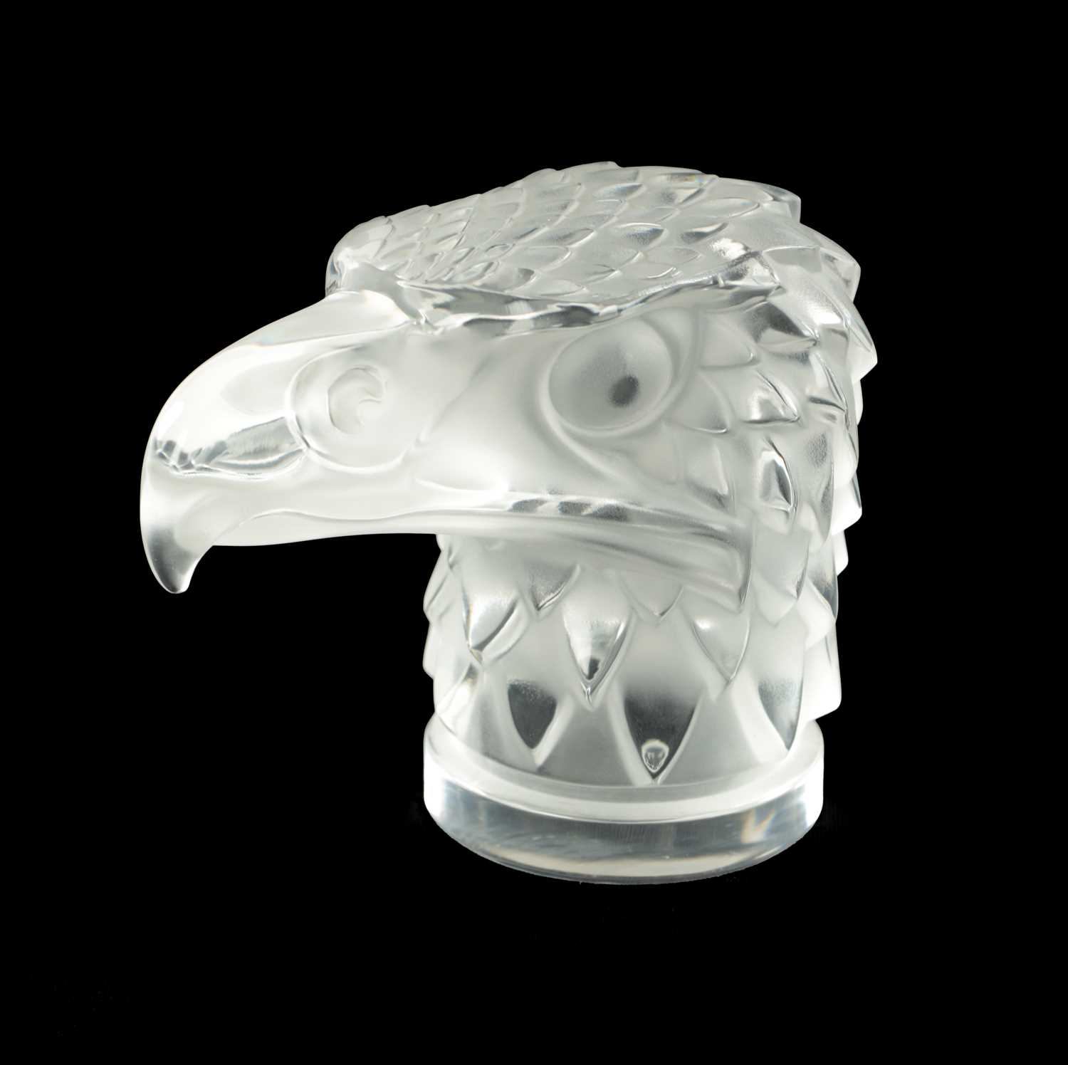 Lot 16 - A RENE LALIQUE STYLE 'TETE D'AIGLE' CLEAR AND FROSTED GLASS CAR MASCOT