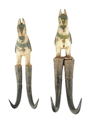 Lot 47 - A PAIR OF BLACK FOREST CARVED POLYCHROME COAT HOOKS