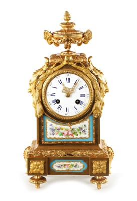Lot 1331 - A LATE 19TH CENTURY FRENCH PORCELAIN PANELLED ORMOLU MANTEL CLOCK