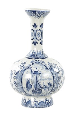 Lot 464 - A 19TH CENTURY BLUE AND WHITE DELFT BOTTLE VASE