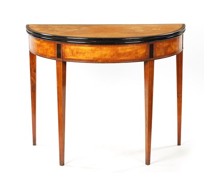 Lot 1494 - A GEORGE III SATINWOOD AND INLAID EBONISED DEMI LUNE FOLD OVER CARD TABLE