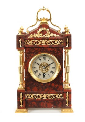 Lot 1202 - A LATE 19TH CENTURY FRENCH ORMOLU MOUNTED ROUGE MARBLE MANTEL CLOCK