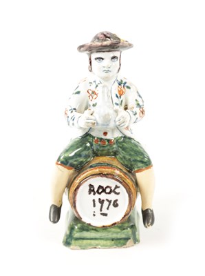Lot 465 - AN 18TH / 19TH CENTURY DELFT POLYCHROME FIGURE
