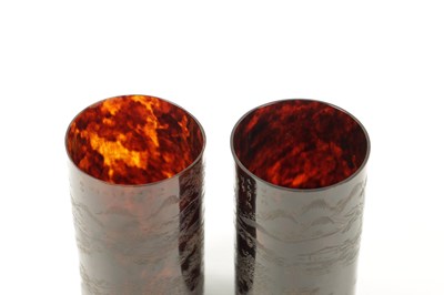 Lot 487 - A PAIR OF 19TH CENTURY CHINESE ENGRAVED TORTOISESHELL BEAKERS