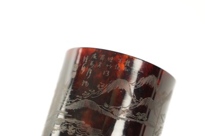 Lot 487 - A PAIR OF 19TH CENTURY CHINESE ENGRAVED TORTOISESHELL BEAKERS