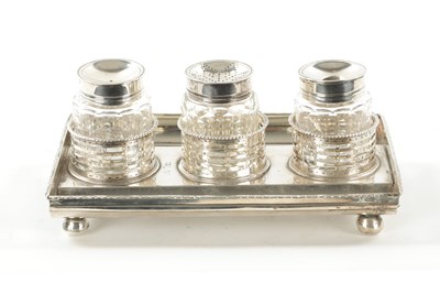 Lot 734 - A GEORGE III SILVER DOUBLE-SIDED TRIPLE  PEN AND INK STAND