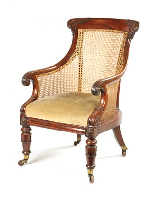 Lot 307 - A GOOD WILLIAM V CARVED MAHOGANY BERGERE LIBRARY CHAIR WITH OLD LANCASTER PAPER LABEL - POSSIBLY GILLOWS