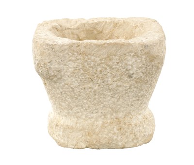 Lot 111 - AN EARLY MEDIEVAL STYLE CARVED MARBLE SQUARE SHAPED MORTAR