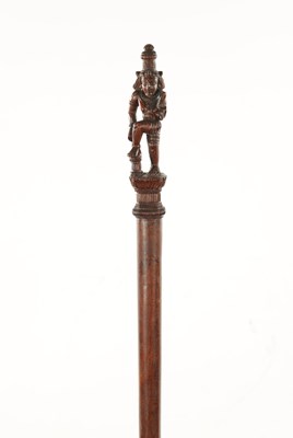 Lot 184 - AN EARLY 20TH CENTURY INDIAN CARVED HARDWOOD CANE WITH CARVED GODESS HANDLE