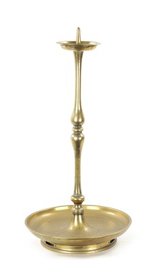 Lot 167 - A 19TH CENTURY EASTERN BRASS CANDLESTICK