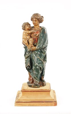 Lot 291 - AN EARLY 18TH CENTURY POLYCHROME CARVING OF MADONNA AND CHILD