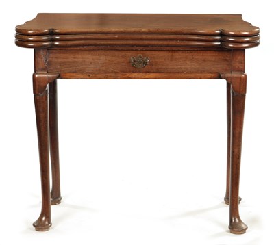 Lot 452 - A GEORGE II FIGURED MAHOGANY TRIPLE TOP FOLD-OVER GAMES TABLE