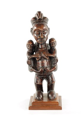Lot 148 - AN ANTIQUE CARVED HARDWOOD YAKA MATERNITY CONGO FIGURE