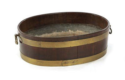Lot 44 - A GEORGE III OVAL BRASS BOUND MAHOGANY WINE COOLER