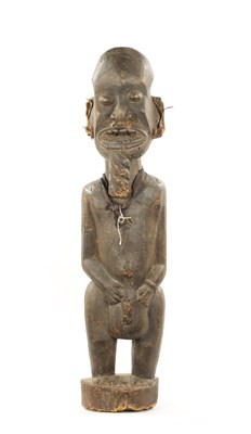 Lot 54 - AN ANTIQUE NIGERIAN MALE FERTILITY FIGURE