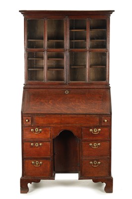 Lot 5 - AN UNUSUAL QUEEN ANNE OAK KNEEHOLE BUREAU BOOKCASE