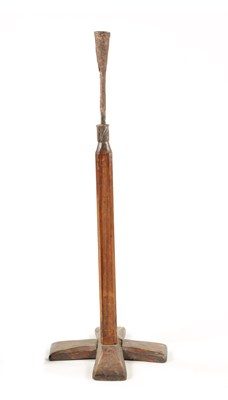 Lot 97 - AN 18TH CENTURY PINE AND WROUGHT IRON  RUSTIC CANDLESTICK ON STAND