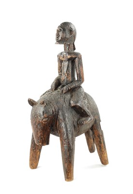 Lot 89 - AN ANTIQUE CARVED HARDWOOD AFRICAN FIGURE ON HORSEBACK