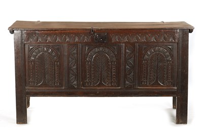 Lot 213 - A LARGE 17TH CENTURY CARVED THREE PANELLED OAK COFFER