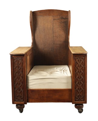Lot 1278 - AN ARTS AND CRAFTS METAMORPHIC OAK ARMCHAIR