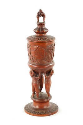 Lot 376 - A FINE 19TH CENTURY BAVARIAN LINDEN-WOOD CARVED TREEN CHALIS AND COVER