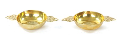 Lot 119 - A PAIR OF EARLY CAST BRASS PORRINGERS