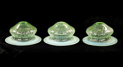 Lot 454 - A SET OF THREE 19TH CENTURY VASELINE GLASS SHADES