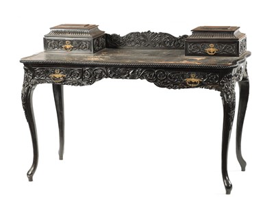 Lot 593 - A 19TH CENTURY CARVED COROMANDEL INDO-PORTUGUESE WRITING DESK