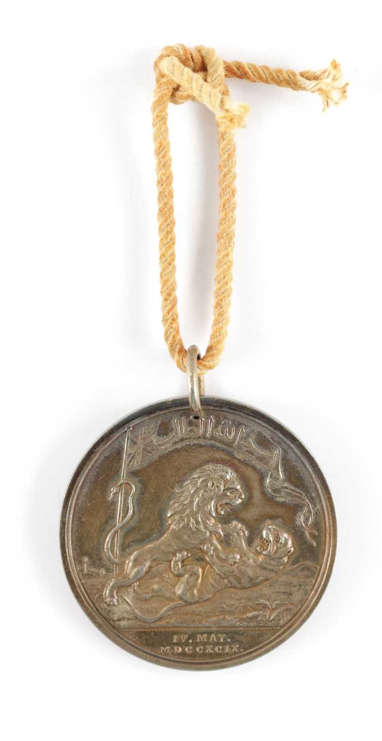 Lot 889 - AN INDIAN BATTLE OF SERINGAPATAM SILVER MEDAL 1799