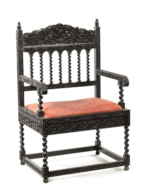 Lot 608 - A GOOD 18TH CENTURY CARVED INDIAN COROMANDEL COAST EBONY ARMCHAIR