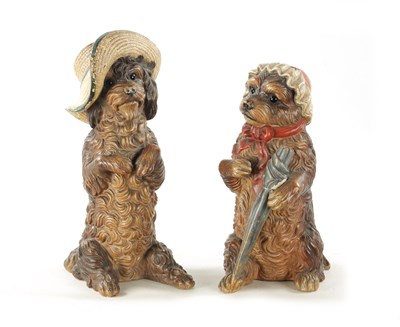 Lot 948 - A PAIR OF LATE 19TH CENTURY AUSTRIAN COLD-PAINTED TERRACOTTA MODELS OF DOGS