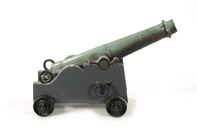 Lot 820 - A 19TH CENTURY GREEN PATINATED SIGNALLING CANON