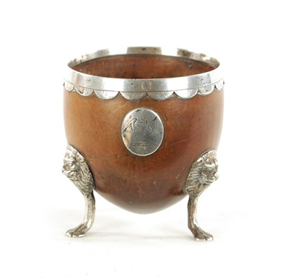 Lot 1093 - AN 18TH CENTURY SILVER MOUNTED CARVED COCONUT CUP