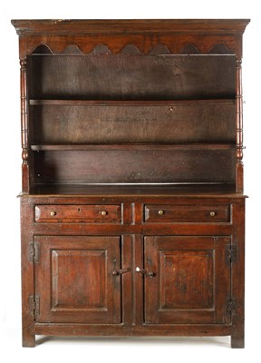 Lot 1372 - AN EARLY 18TH CENTURY OAK POSTED CANOPY DRESSER