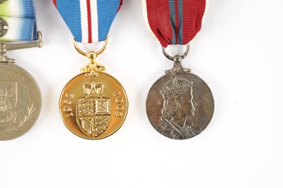 Lot 878 - A 1982 FALKLANDS WAR SOUTH ATLANTIC MEDAL WITH ROSETTE.