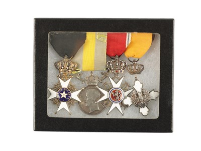 Lot 913 - A GROUP OF FOUR COMMANDER’S MEDALS