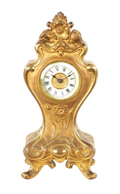 Lot 1253 - A GILT BRONZE ART NOUVEAU MANTEL CLOCK