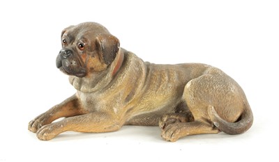 Lot 1034 - A 19TH CENTURY AUSTRIAN PAINTED TERRACOTTA SCULPTURE OF A RECUMBENT MASTIFF