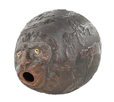 Lot 1058 - A FINE 18TH CENTURY CARVED COCONUT POWDER FLASK