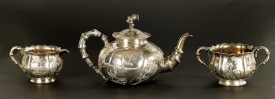 Lot 543 - A LATE 19TH CENTURY CHINESE SILVER THREE-PIECE TEA SET