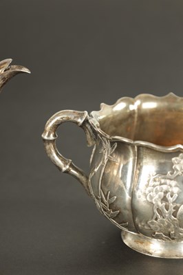 Lot 543 - A LATE 19TH CENTURY CHINESE SILVER THREE-PIECE TEA SET