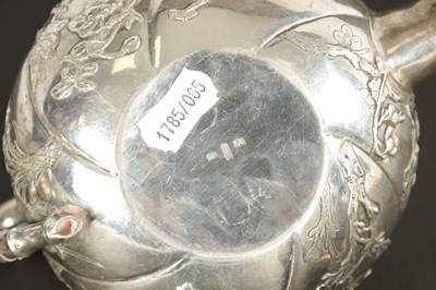 Lot 543 - A LATE 19TH CENTURY CHINESE SILVER THREE-PIECE TEA SET