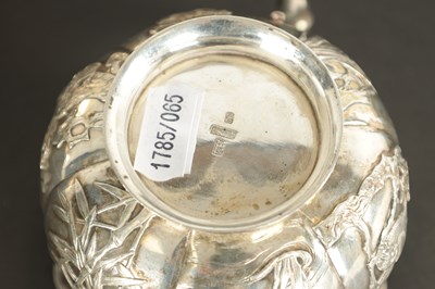 Lot 543 - A LATE 19TH CENTURY CHINESE SILVER THREE-PIECE TEA SET