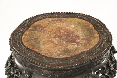 Lot 529 - A 19TH CENTURY CHINESE CARVED HARDWOOD JARDINIERE STAND