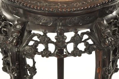 Lot 529 - A 19TH CENTURY CHINESE CARVED HARDWOOD JARDINIERE STAND