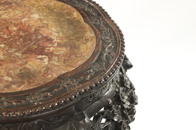 Lot 529 - A 19TH CENTURY CHINESE CARVED HARDWOOD JARDINIERE STAND